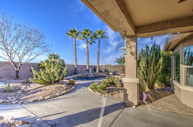 view of patio with a fenced backyard