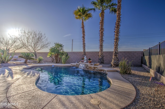 view of pool featuring a fenced in pool, a fenced backyard, and a patio area