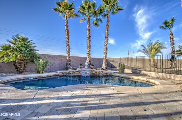 view of swimming pool with a patio area, a fenced backyard, and a fenced in pool