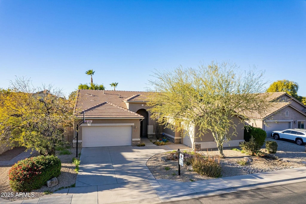 view of front of property featuring a garage