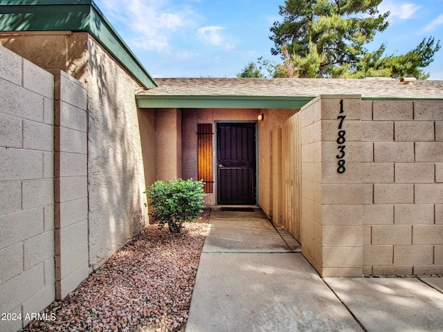 17838 N 45th Ave, Glendale, AZ 85308 - doorway to property with stucco siding and roof with shingles