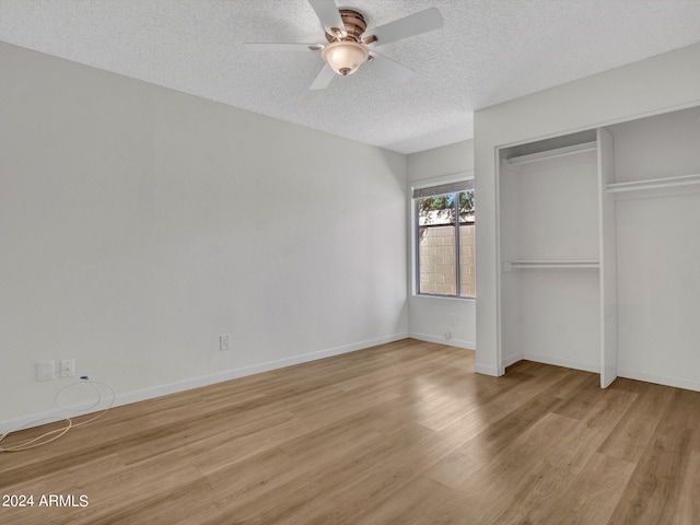 17838 N 45th Ave, Glendale, AZ 85308 - unfurnished bedroom with a textured ceiling, ceiling fan, a closet, baseboards, and light wood-type flooring