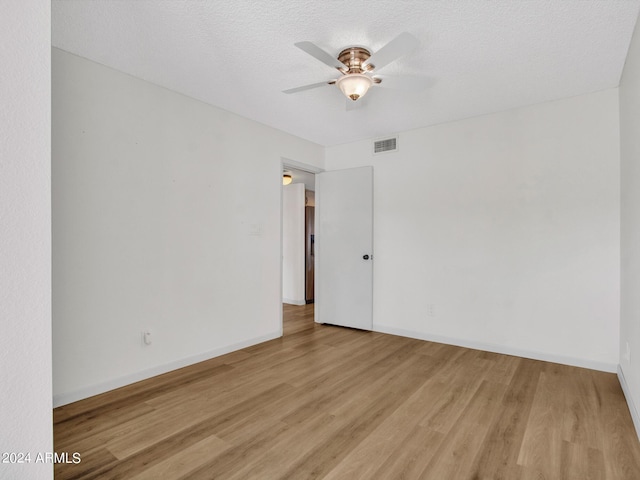 17838 N 45th Ave, Glendale, AZ 85308 - spare room featuring visible vents, ceiling fan, baseboards, and light wood-style floors