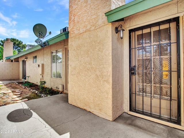 17838 N 45th Ave, Glendale, AZ 85308 - entrance to property featuring stucco siding, fence, and a patio area