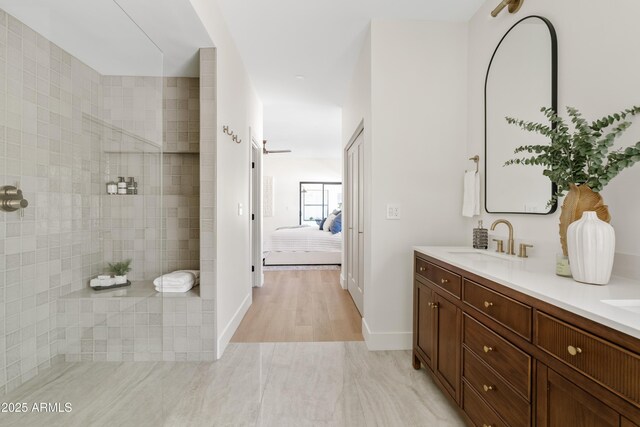 14401 N 60th Pl, Scottsdale, AZ 85254 - ensuite bathroom featuring double vanity, a walk in shower, and wood finished floors
