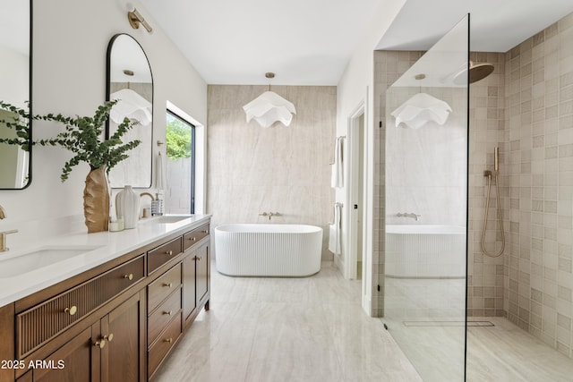 14401 N 60th Pl, Scottsdale, AZ 85254 - bathroom featuring a walk in shower, double vanity, a freestanding tub, and tile walls