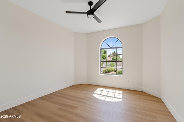 14401 N 60th Pl, Scottsdale, AZ 85254 - unfurnished room featuring light wood-style floors and ceiling fan