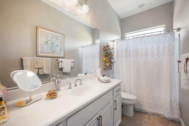 bathroom with tile patterned floors, vanity, toilet, and a shower with shower curtain