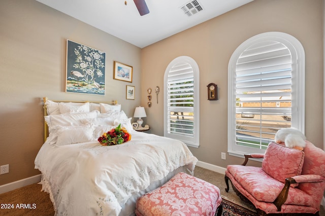 carpeted bedroom featuring ceiling fan