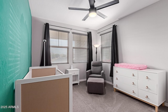 bedroom featuring carpet, ceiling fan, and baseboards