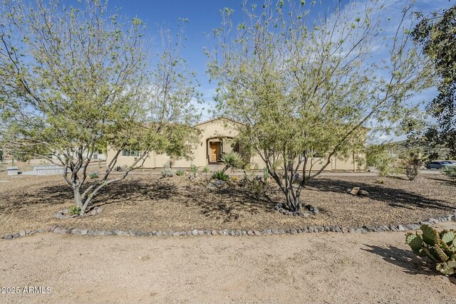 17324 E Quail Track Rd, Rio Verde, AZ 85263 - view of front of house featuring stucco siding