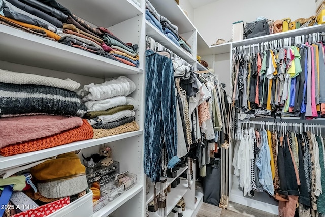 17324 E Quail Track Rd, Rio Verde, AZ 85263 - walk in closet with wood finished floors