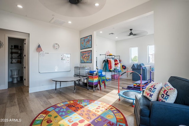 18125 W Montebello Ct Unit 67, Litchfield Park, AZ 85340 - rec room with a ceiling fan, wood finished floors, baseboards, and recessed lighting
