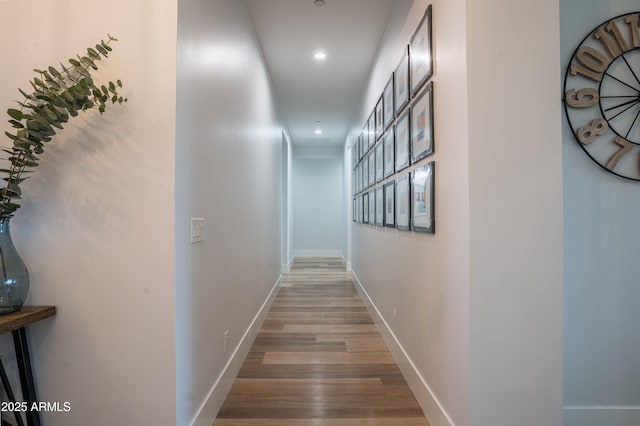 18125 W Montebello Ct Unit 67, Litchfield Park, AZ 85340 - hall with recessed lighting, wood finished floors, and baseboards