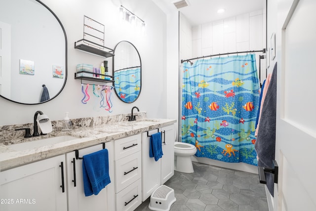 18125 W Montebello Ct Unit 67, Litchfield Park, AZ 85340 - full bath featuring double vanity, toilet, a shower with curtain, tile patterned floors, and recessed lighting