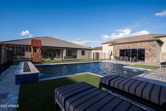 18125 W Montebello Ct Unit 67, Litchfield Park, AZ 85340 - view of pool featuring a patio and an outdoor fire pit