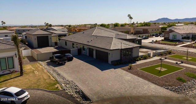 18125 W Montebello Ct Unit 67, Litchfield Park, AZ 85340 - aerial perspective of suburban area with a mountain backdrop
