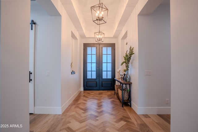 18125 W Montebello Ct Unit 67, Litchfield Park, AZ 85340 - foyer entrance featuring a chandelier, baseboards, and french doors