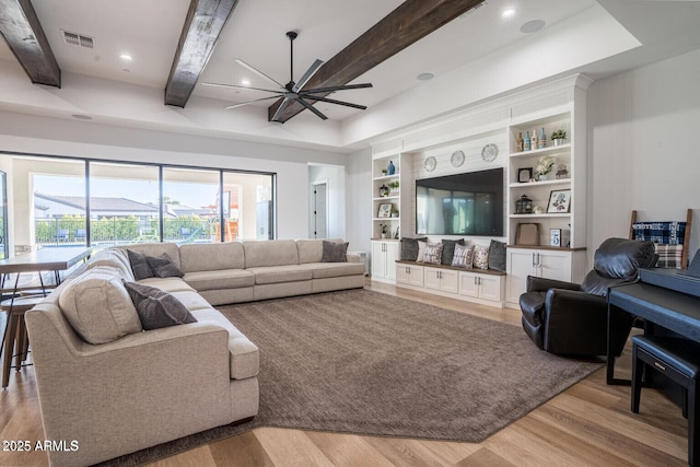 18125 W Montebello Ct Unit 67, Litchfield Park, AZ 85340 - living area featuring a ceiling fan, light wood-style flooring, beam ceiling, recessed lighting, and built in features