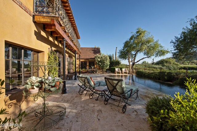 27050 N 103rd St, Scottsdale, AZ 85262 - view of patio / terrace with an outdoor pool