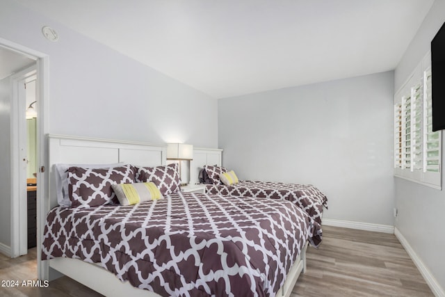 bedroom featuring light hardwood / wood-style floors