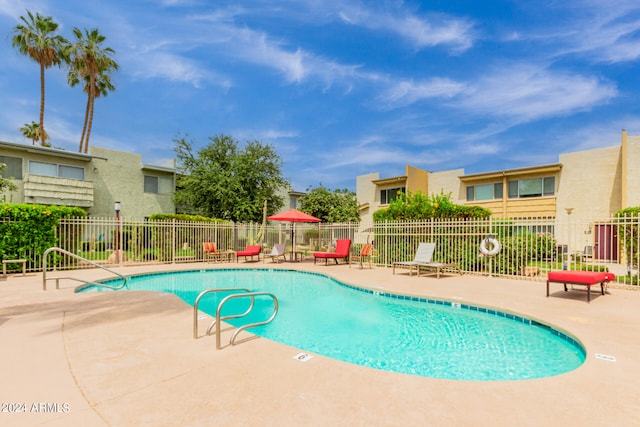 view of pool featuring a patio area