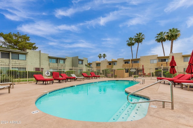 view of swimming pool featuring a patio