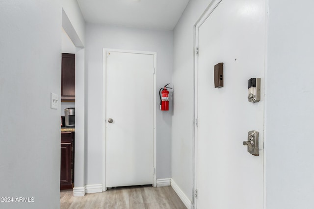 hallway featuring light wood-type flooring