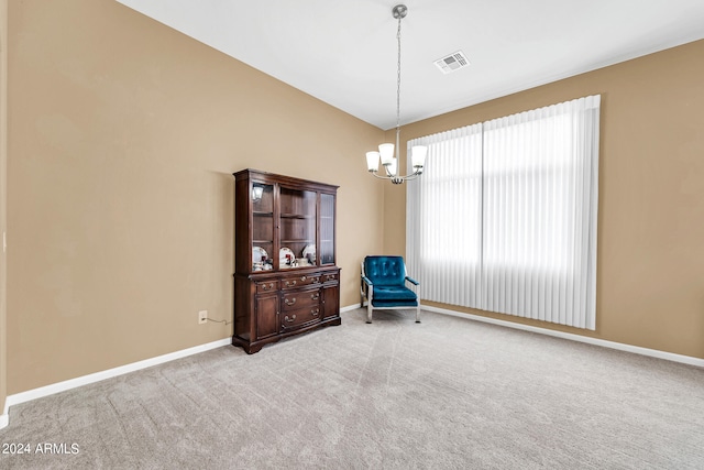 living area with carpet floors, visible vents, a notable chandelier, and baseboards