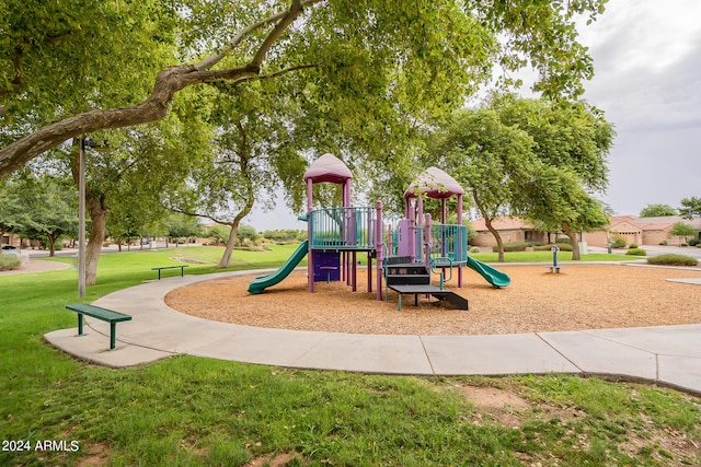 community play area featuring a yard