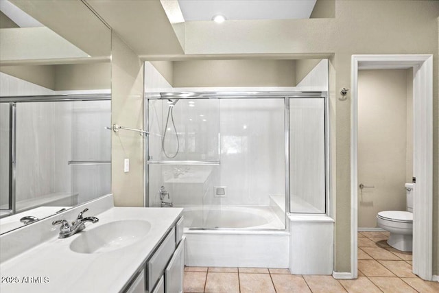 full bathroom featuring tile patterned flooring, vanity, independent shower and bath, and toilet