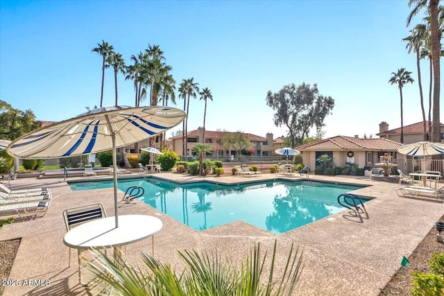 view of swimming pool featuring a patio