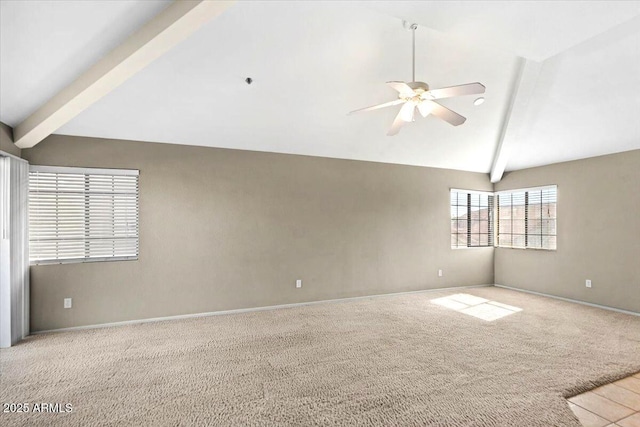 carpeted empty room with beam ceiling, high vaulted ceiling, and ceiling fan