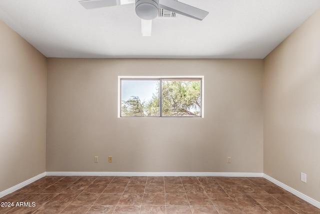 spare room featuring ceiling fan