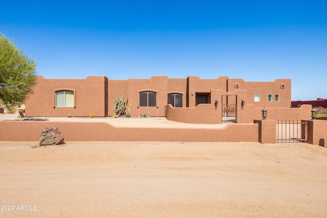 view of pueblo revival-style home