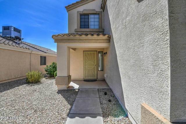 property entrance featuring central air condition unit