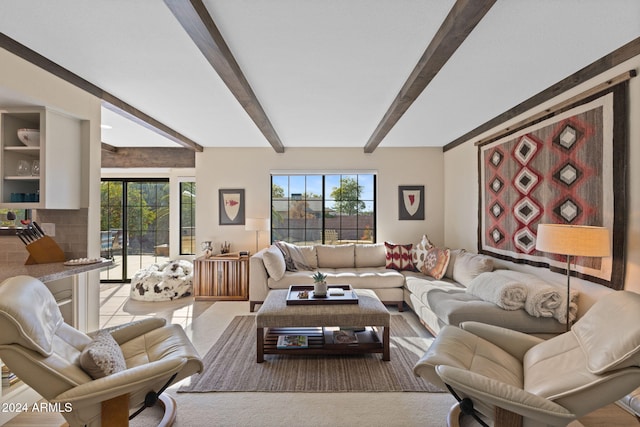 living room with beam ceiling