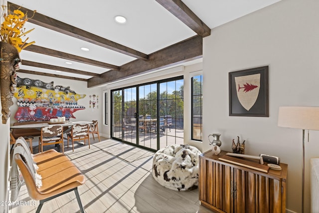 living room with beamed ceiling