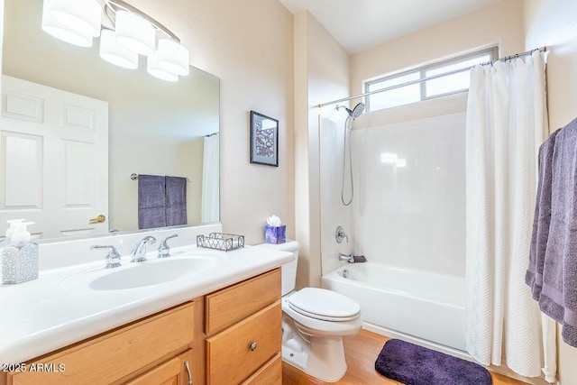 full bathroom with hardwood / wood-style floors, vanity, toilet, and shower / bathtub combination with curtain