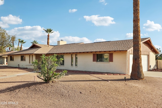 ranch-style home with a garage