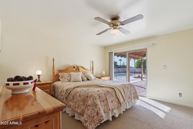 carpeted bedroom with access to outside and ceiling fan