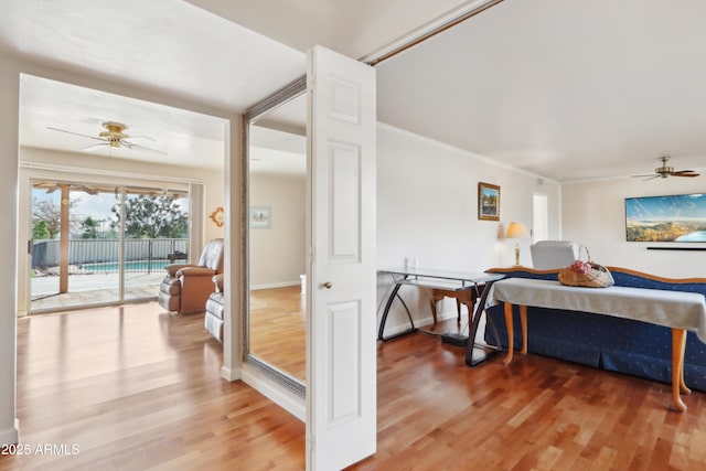 bedroom featuring access to exterior and wood-type flooring