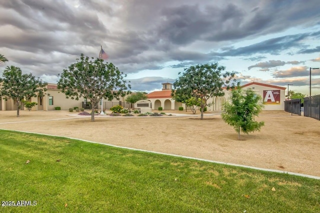 view of property's community with a yard