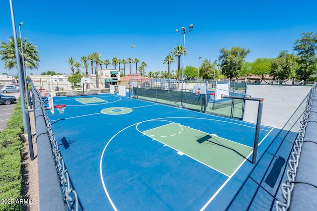 view of basketball court with tennis court