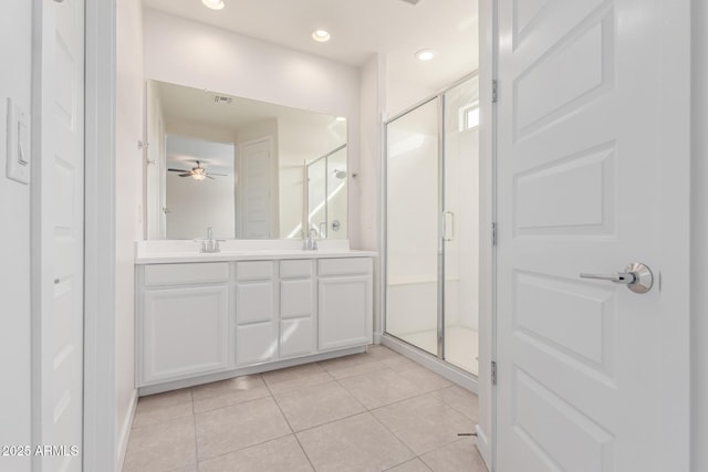 bathroom featuring vanity, tile patterned flooring, an enclosed shower, and ceiling fan