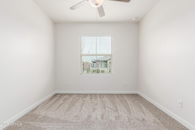 spare room with carpet flooring and ceiling fan