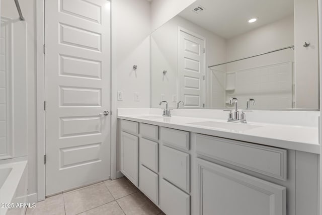 bathroom with vanity and tile patterned flooring