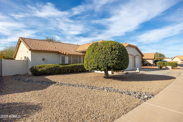 view of front of home with a garage