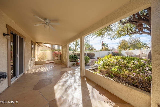 view of patio / terrace featuring ceiling fan