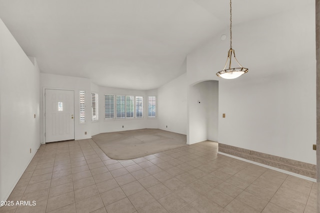 interior space featuring vaulted ceiling